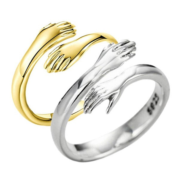 Hug ring in gold and silver