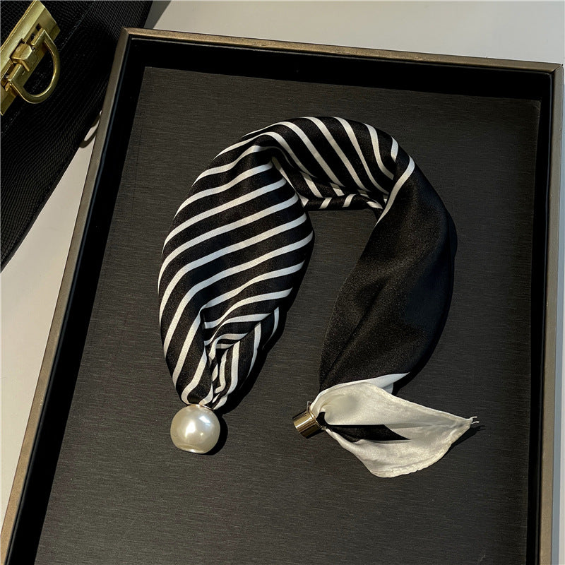 Black stripes neckerchief showing the pearl and the metal clasp end