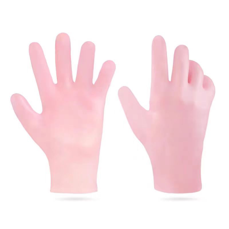 Pair of pink silicone moisturizing gloves