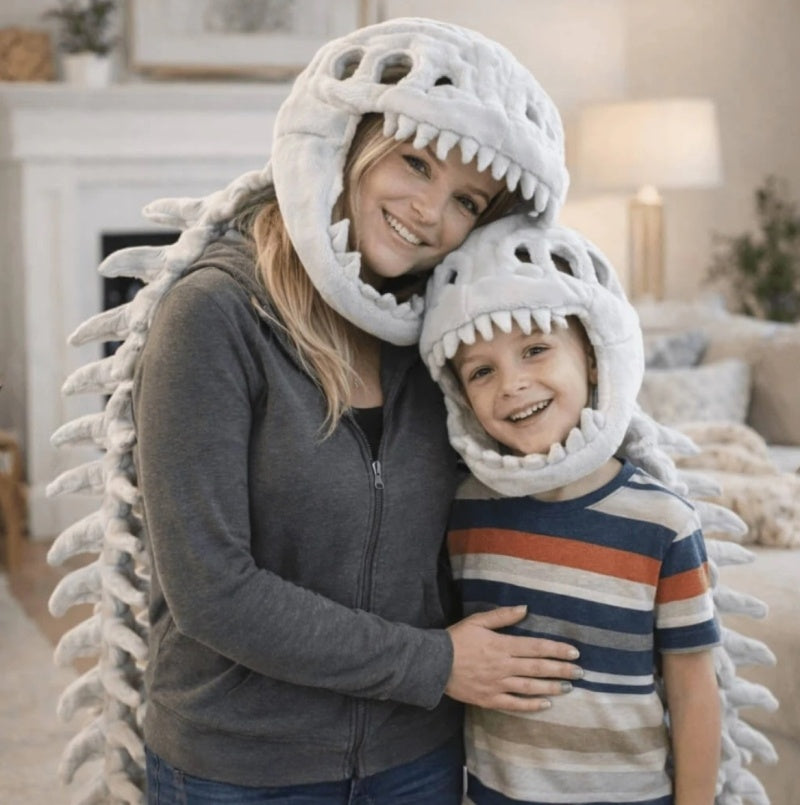 Parent and child in matching dino skeleton hats