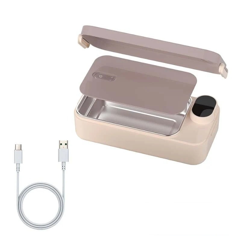 Pink electric lunch box with lid lifted and USB cable