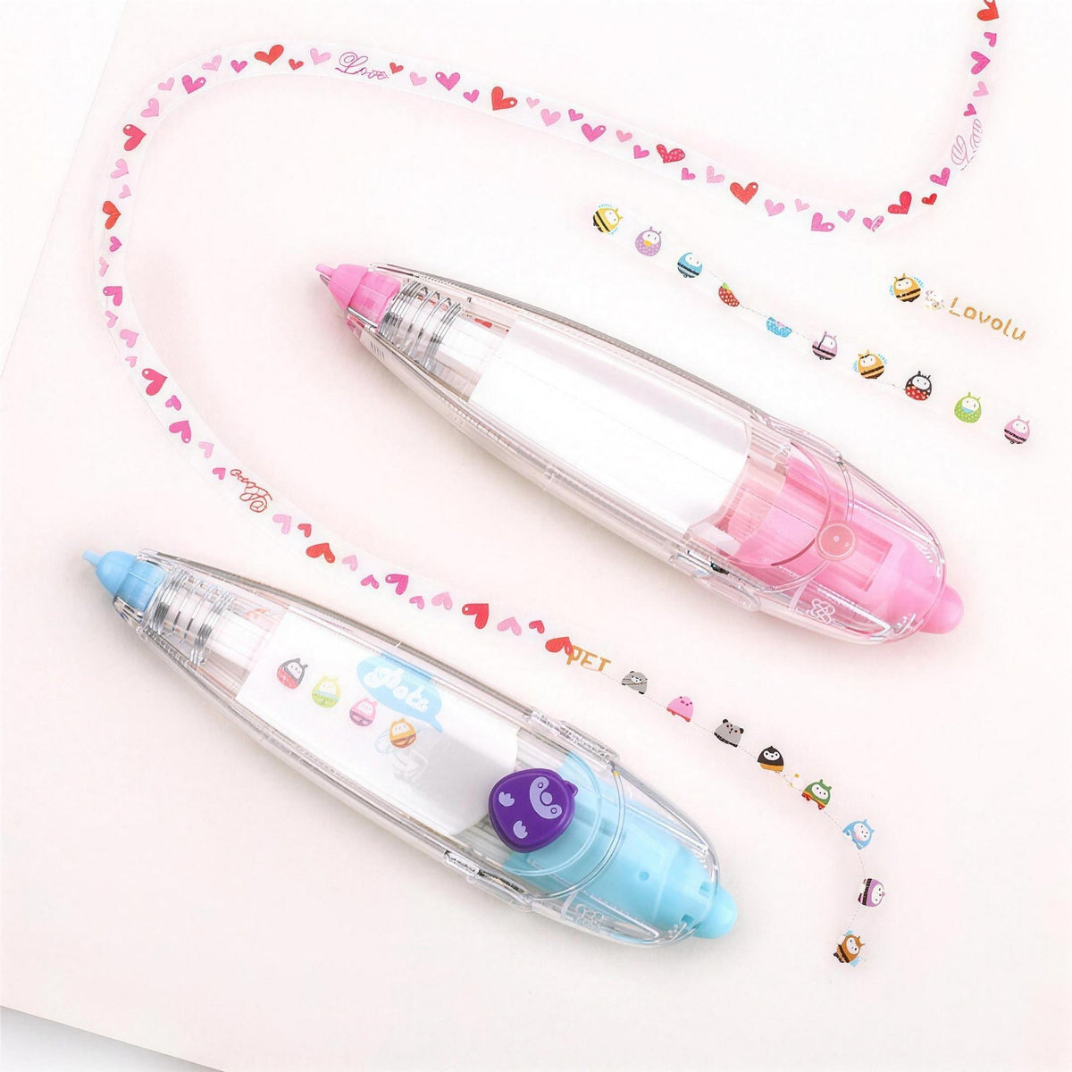 Tape pens drawing a trail of tiny hearts