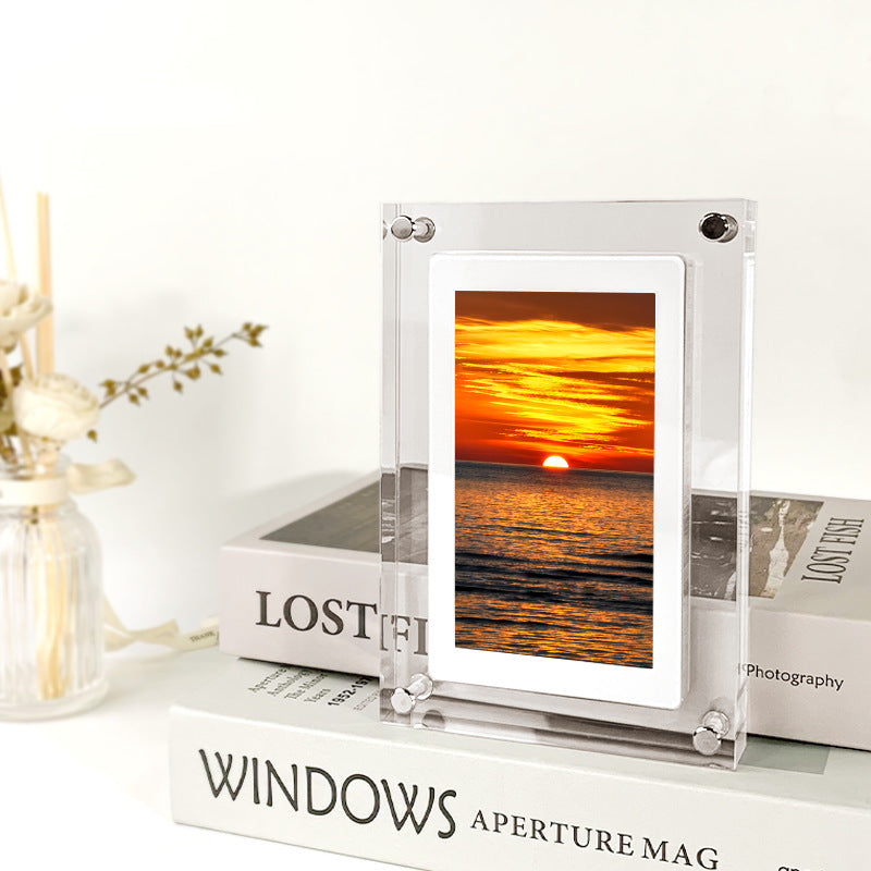 Digital frame displaying family photos as a slideshow
