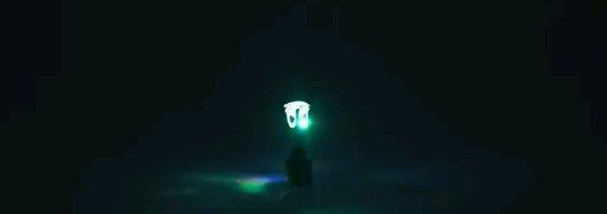 Multicolor LED stud earring glowing in the dark