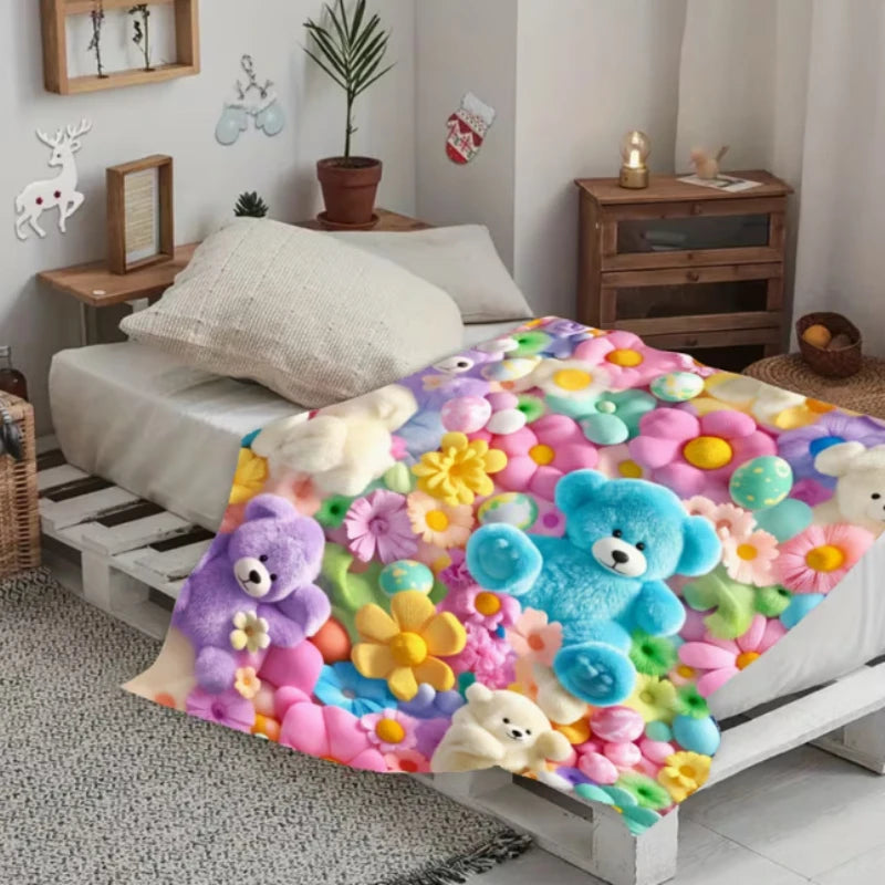 Teddy bear 3D-look blanket spread across a bed in a bright bedroom