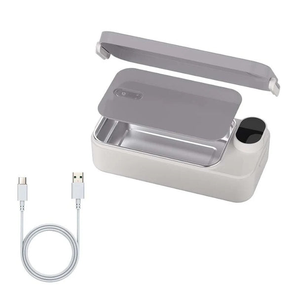 Gray electric lunch box with open lid, stainless tray and USB cable