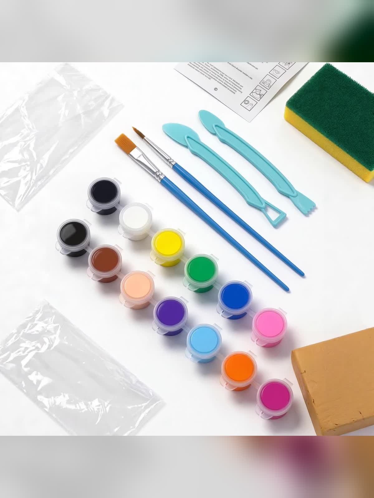 Twelve paint pots, brushes, sculpting tools and clay included in the kit