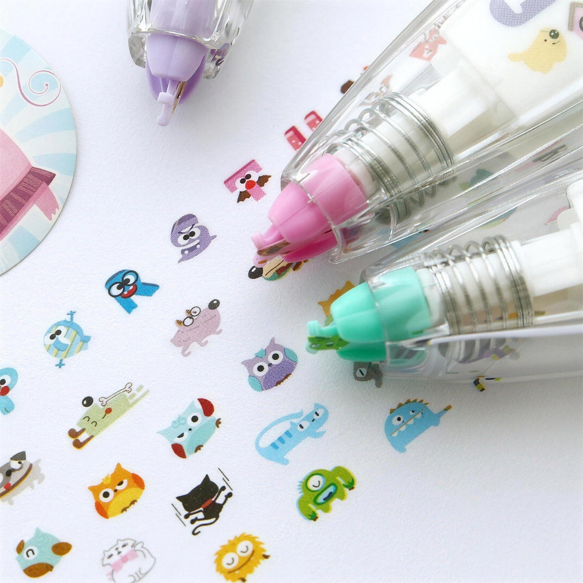 Close-up of tape pens laying down cute animal patterns