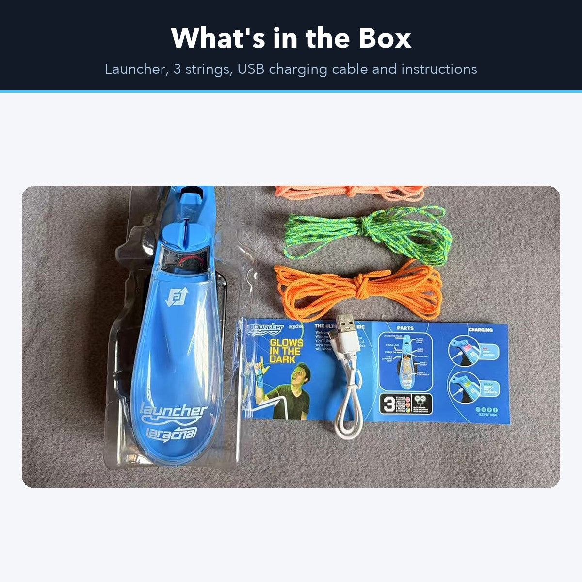 Box contents: wrist launcher, three strings, USB charging cable and instructions