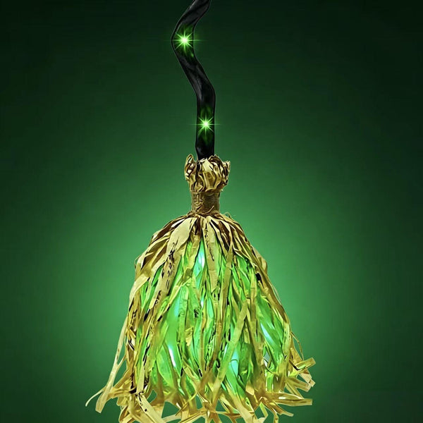 Light-up witch broom glowing green